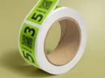 green neon roll labels on a roll printing