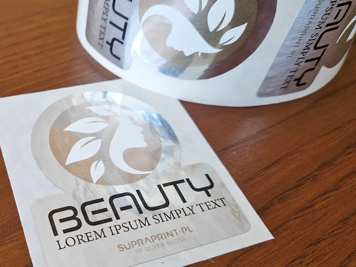 Silver foil labels printed with white ink
